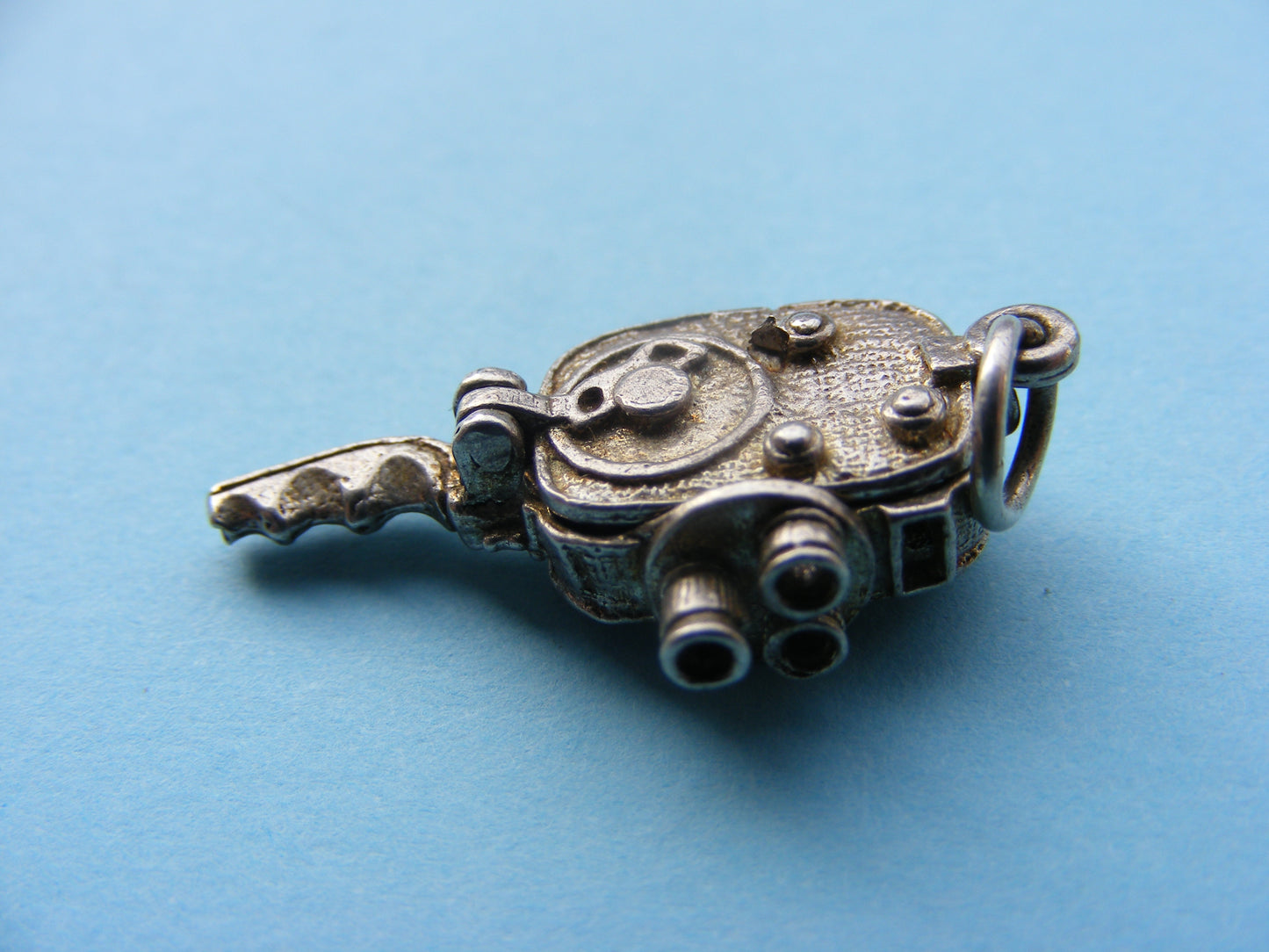 CHIM Vintage Sterling Silver Charm Cine Camera opens to a lady sunbathing