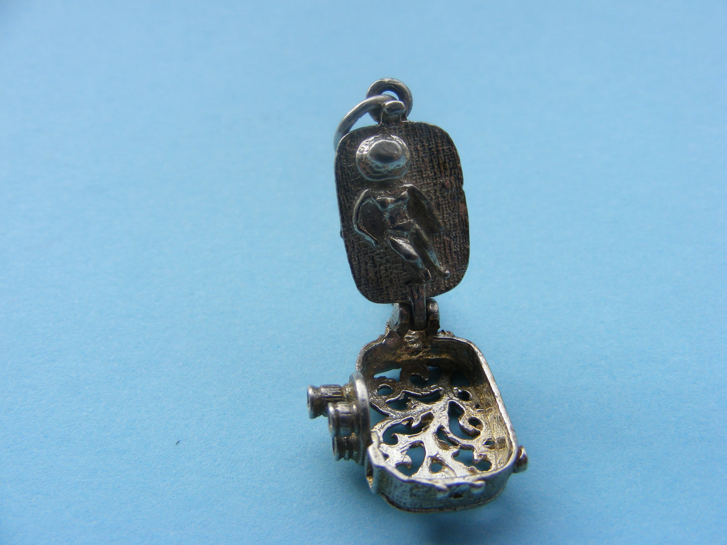 CHIM Vintage Sterling Silver Charm Cine Camera opens to a lady sunbathing